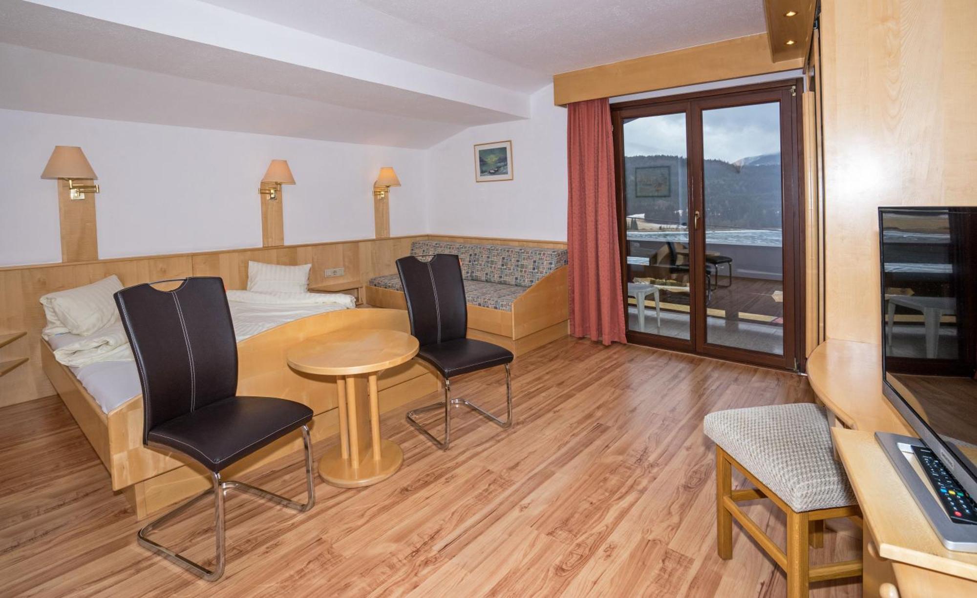 Haus Stampfer Hotell Weissensee Rom bilde
